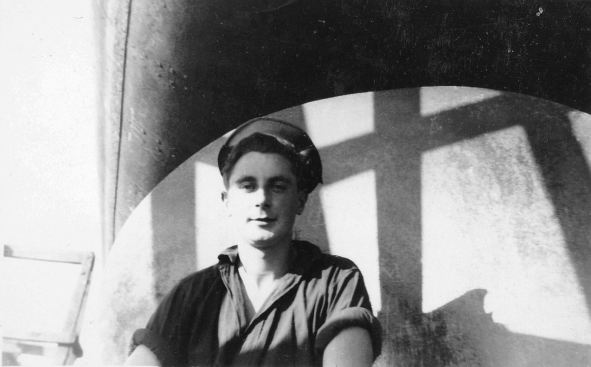 Tom Bilton on ship's propeller.